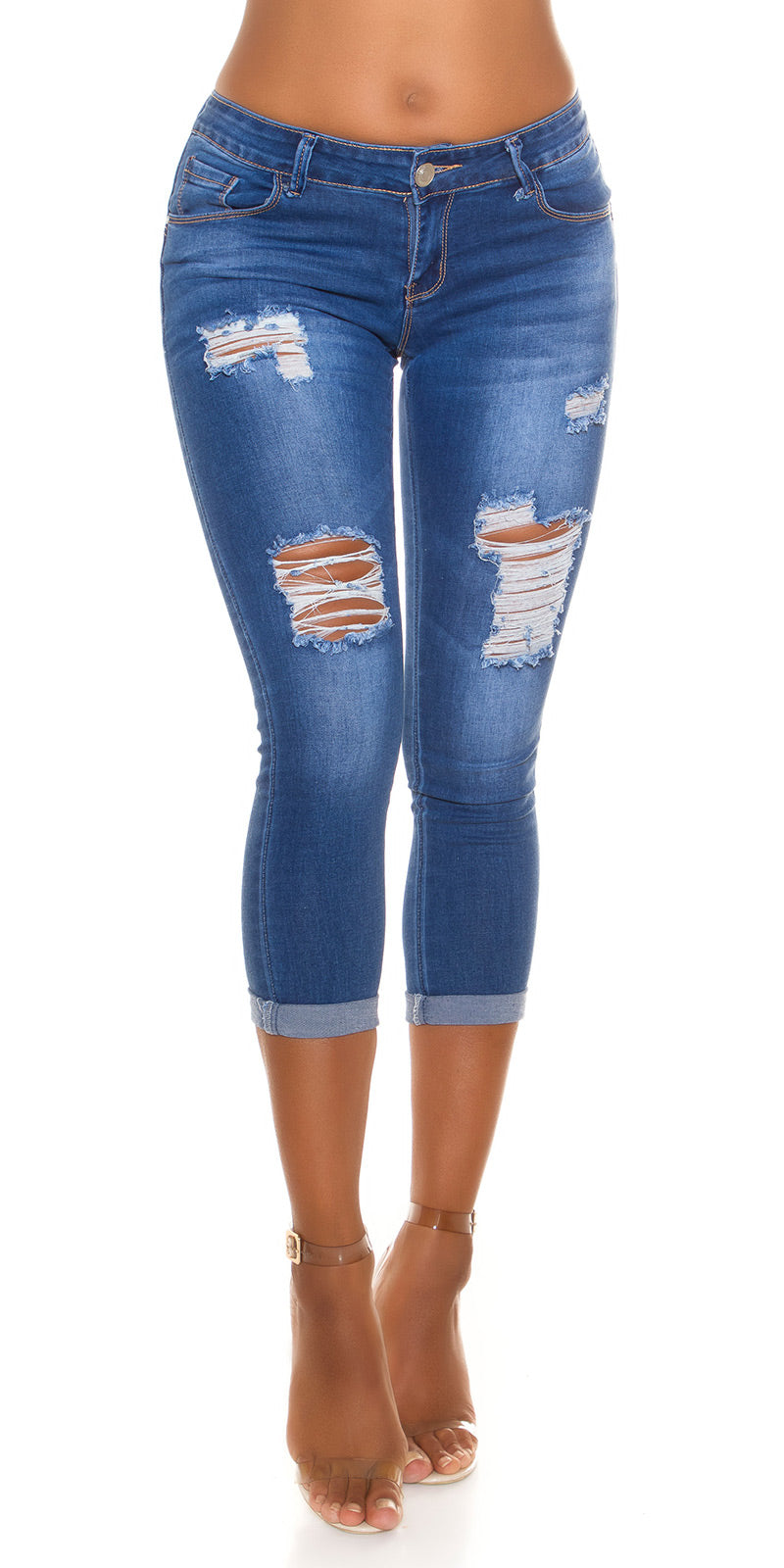 Seksowne jeansy skinny z przetarciami w talii