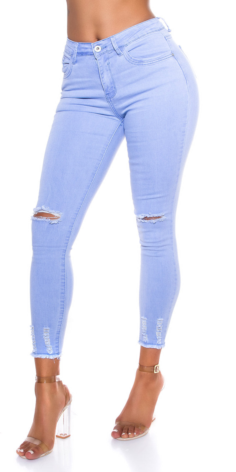 Seksowne jeansy skinny z podartymi nogawkami