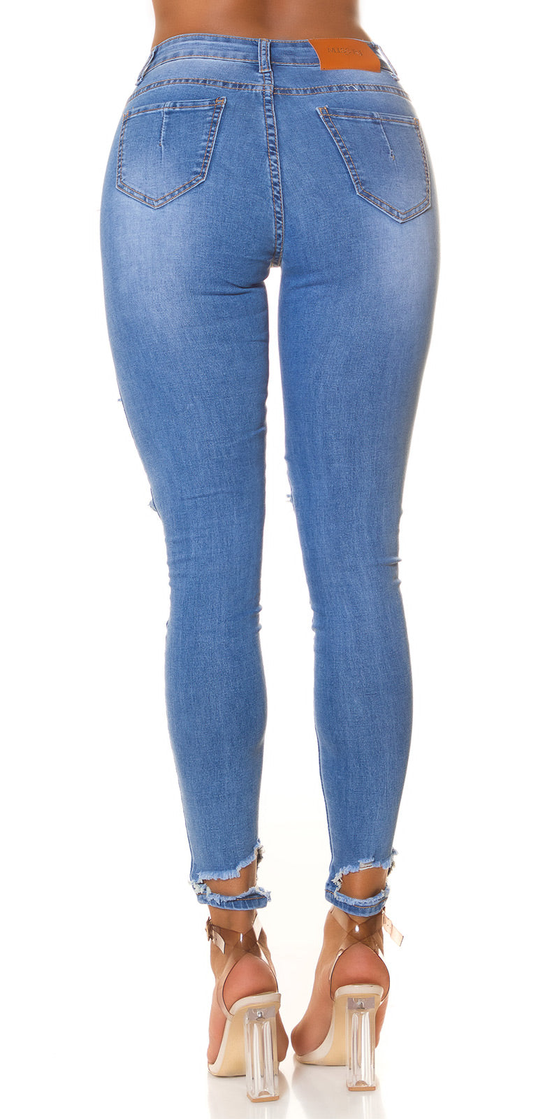 Seksowne jeansy skinny z przetarciami