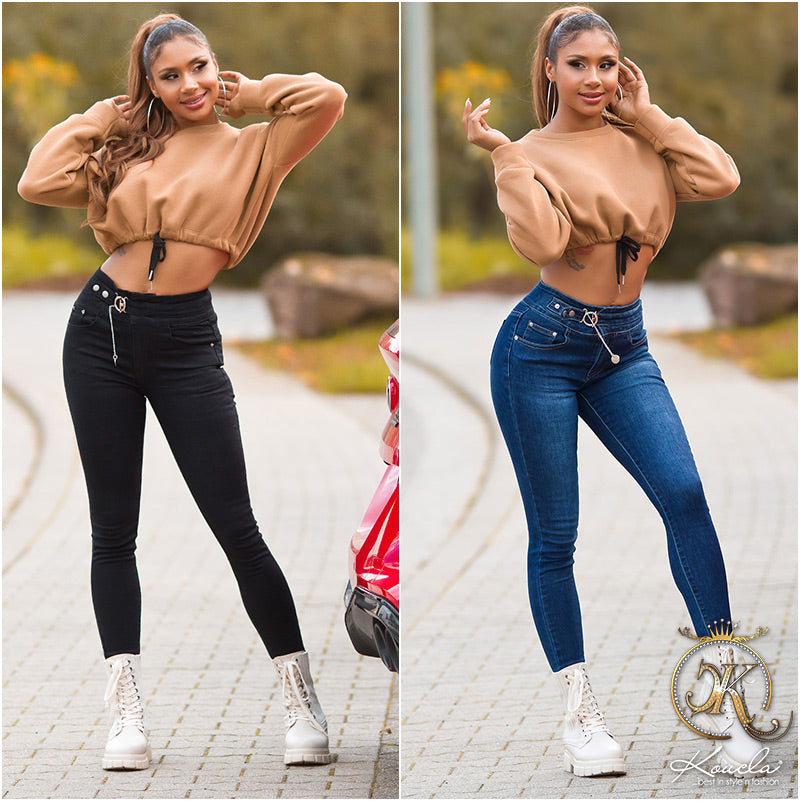 Modne jeansy skinny z wysokim stanem i łańcuszkiem