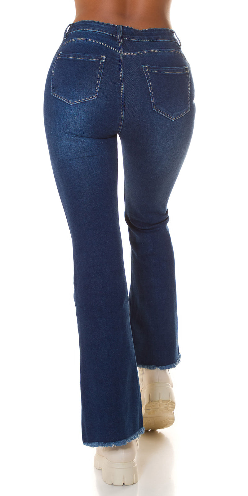 Seksowne jeansy z ciemnego denimu z przetarciami