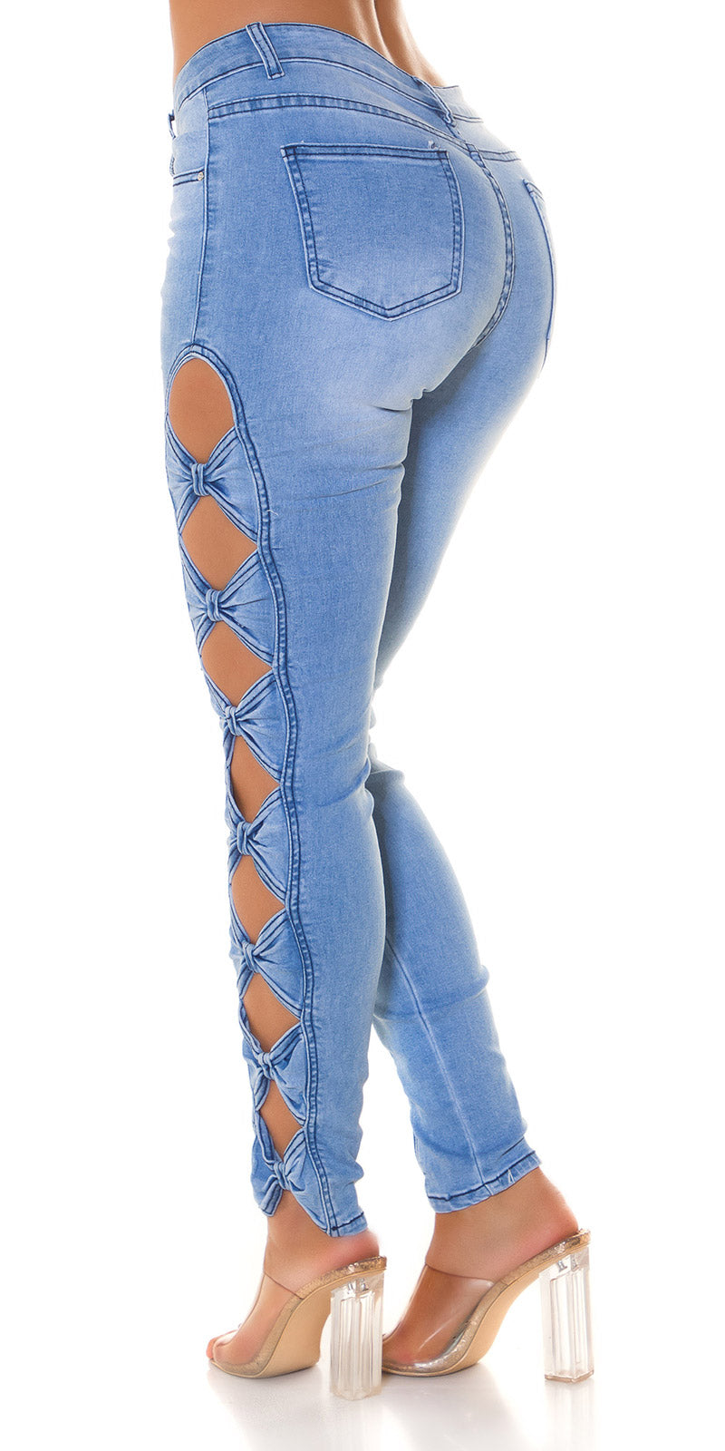 Seksowne jeansy skinny midwaist z wycięciami na kokardki