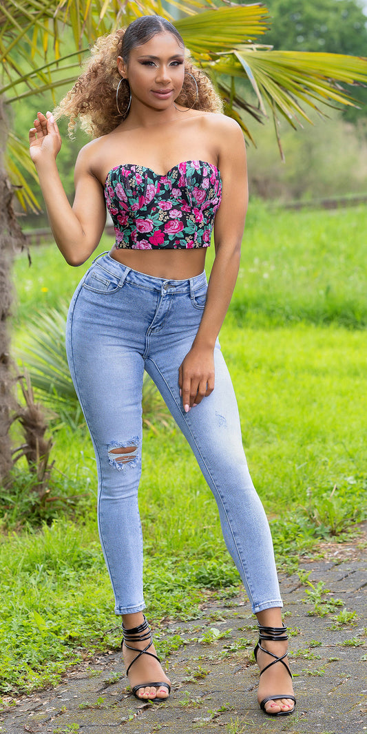Seksowne jeansy skinny z wysokim stanem i rozdartym kolanem