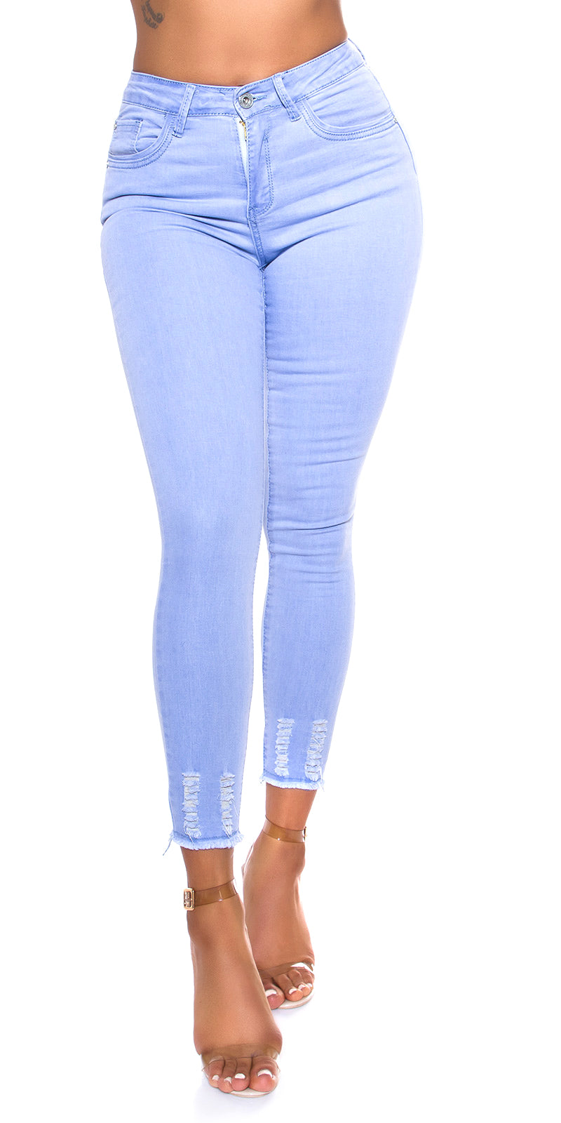 Seksowne jeansy skinny o spranym wyglądzie z poszarpanym dołem