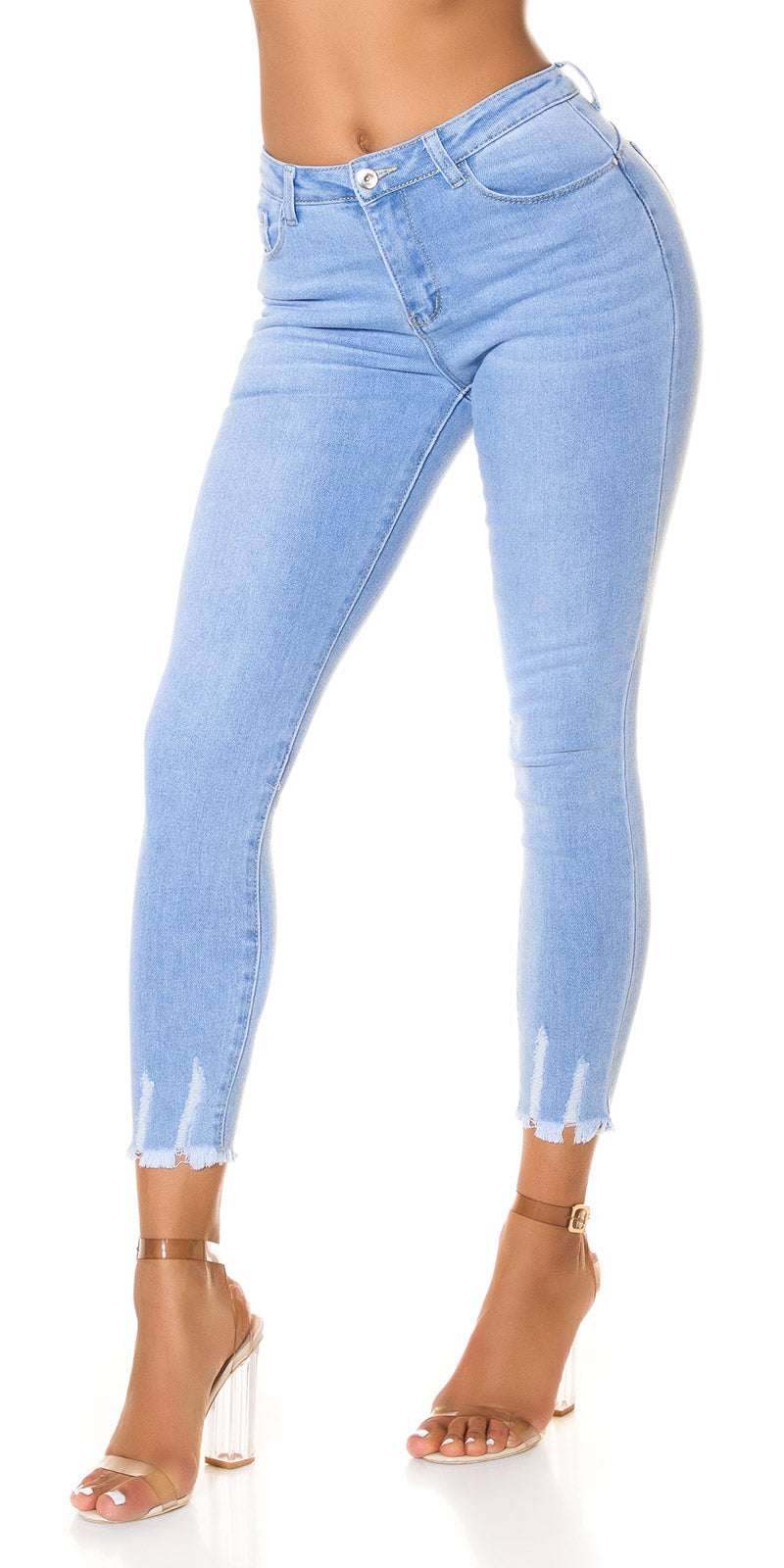 Seksowne jeansy skinny z wysokim stanem i postrzępionym dołem